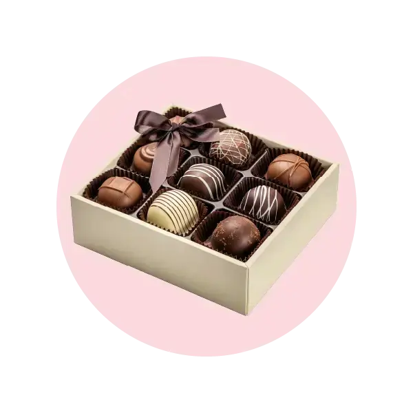 Box of assorted artisan chocolates with a ribbon, perfect for gifting in Melbourne.