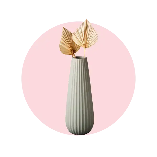 Elegant vase with decorative leaves, perfect for stylish flower arrangements and gifts in Melbourne.