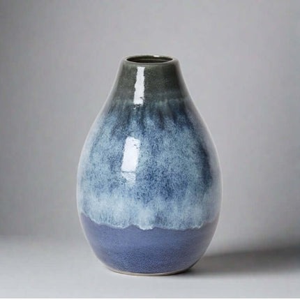 Elegant Arabella Vase Blue with soothing gradient from dark to light blue, perfect for flowers and decor.