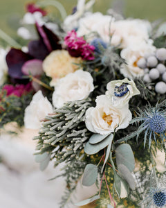 Custom wedding flower arrangement with white roses, lilies, and greenery, perfect for a Melbourne wedding.