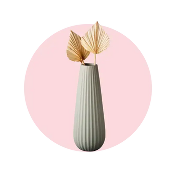 Elegant vase with decorative leaves, perfect for stylish flower arrangements and gifts in Melbourne.