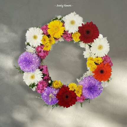 Rainbow Tribute – Vibrant Wreath with Gerberas, Chrysanthemums, and Roses