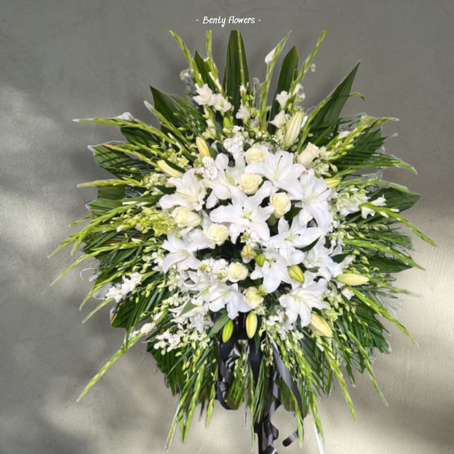 Tranquil White – Elegant Standing Spray with Lilies, Roses, and Orchids