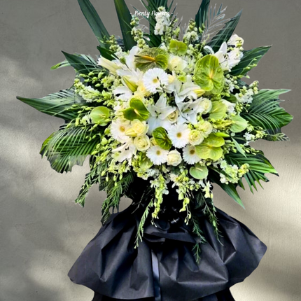 Graceful Farewell – Elegant Standing Spray with Lilies, Roses, and Gerberas