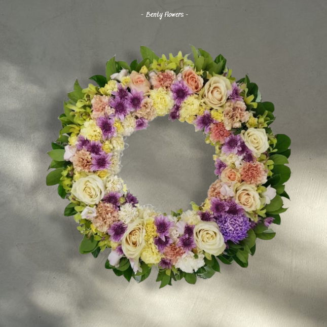 Whispering Grace – Elegant Wreath with Roses, Carnations, and Chrysanthemums