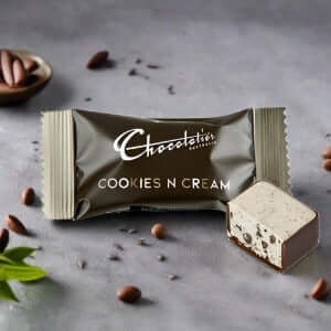 Cookies n Cream chocolate treat, beautifully wrapped with a piece showing creamy interior and chocolate coating.