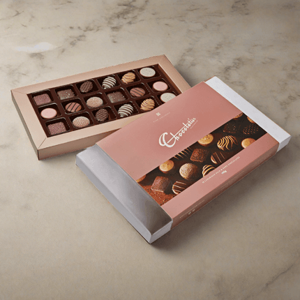 Chocolatier Australia Pure Indulgence Milk & Dark Chocolates box with assorted chocolate selections.