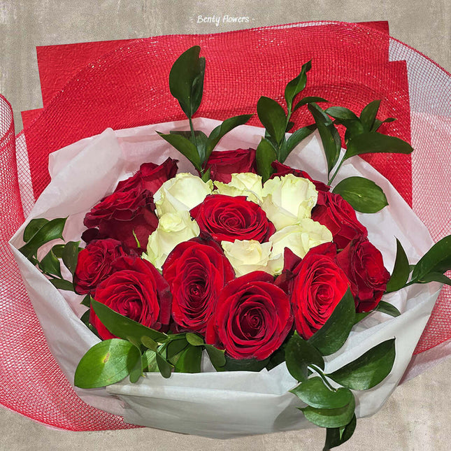 Two-Tone Love bouquet featuring red and white roses, symbolizing romance and grace, perfect for any romantic occasion.