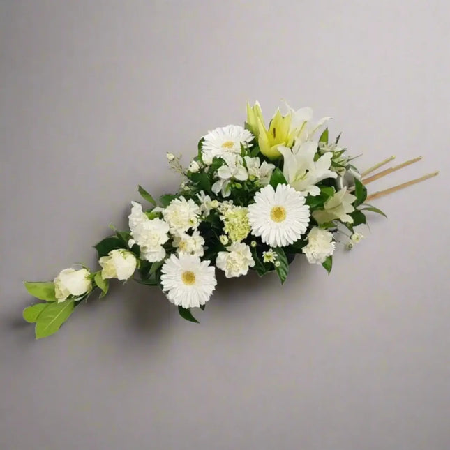 Pure Tranquility floral arrangement featuring white flowers, perfect for funeral tributes in Melbourne.