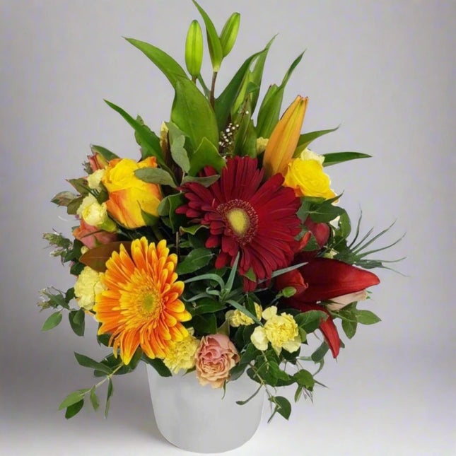 Autumn Radiance Floral Arrangement with Red, Yellow, and Orange Flowers