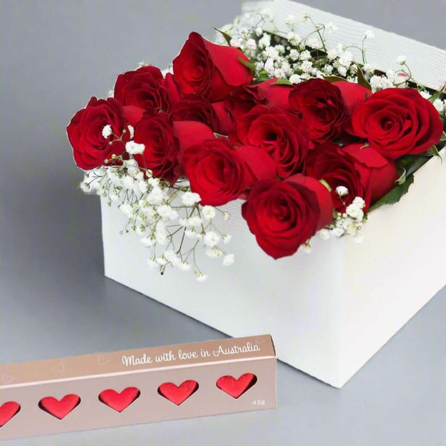Red Enchantment gift box featuring red roses and heart-shaped chocolates, perfect for romance and special occasions.
