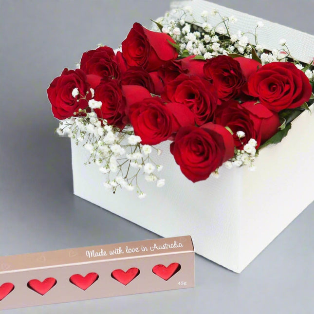 Romantic Red – Rose and Chocolate Gift Box with red roses, baby's breath, and heart-shaped chocolates.