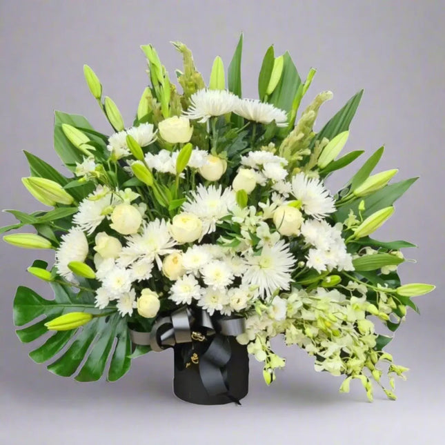 Eternal Peace Spray, elegant white funeral flowers, serene tribute for remembrance in Melbourne.