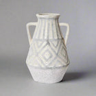 Eliana Vase with textured geometric design, perfect for displaying flowers in any sophisticated home decor.