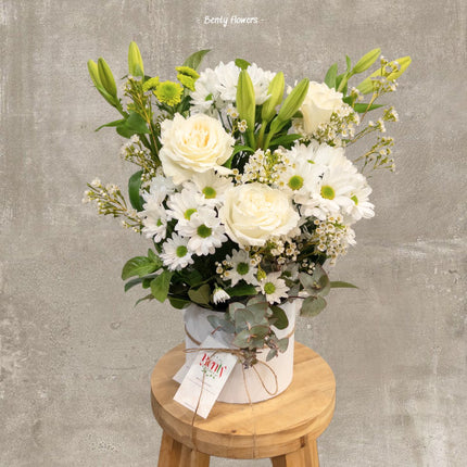 Elegant White Sympathy Hat Box – Fresh White Roses and Lilies, Same-Day Delivery in Carlton & Surrounding Areas.