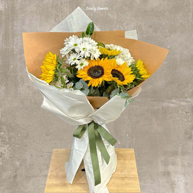 Sunny Promise graduation bouquet featuring vibrant sunflowers and white daisies, perfect for celebrating success in Melbourne.