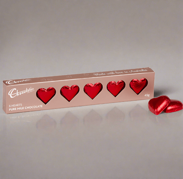 Milk Chocolate Hearts Gift Box with six red foil-wrapped chocolates, perfect for gifting and sharing love. 45g